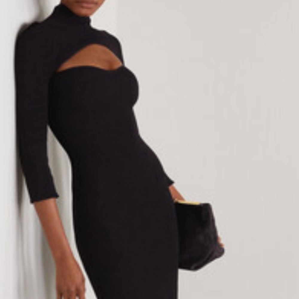 KHAITE
Turtleneck Midi Length Dress
